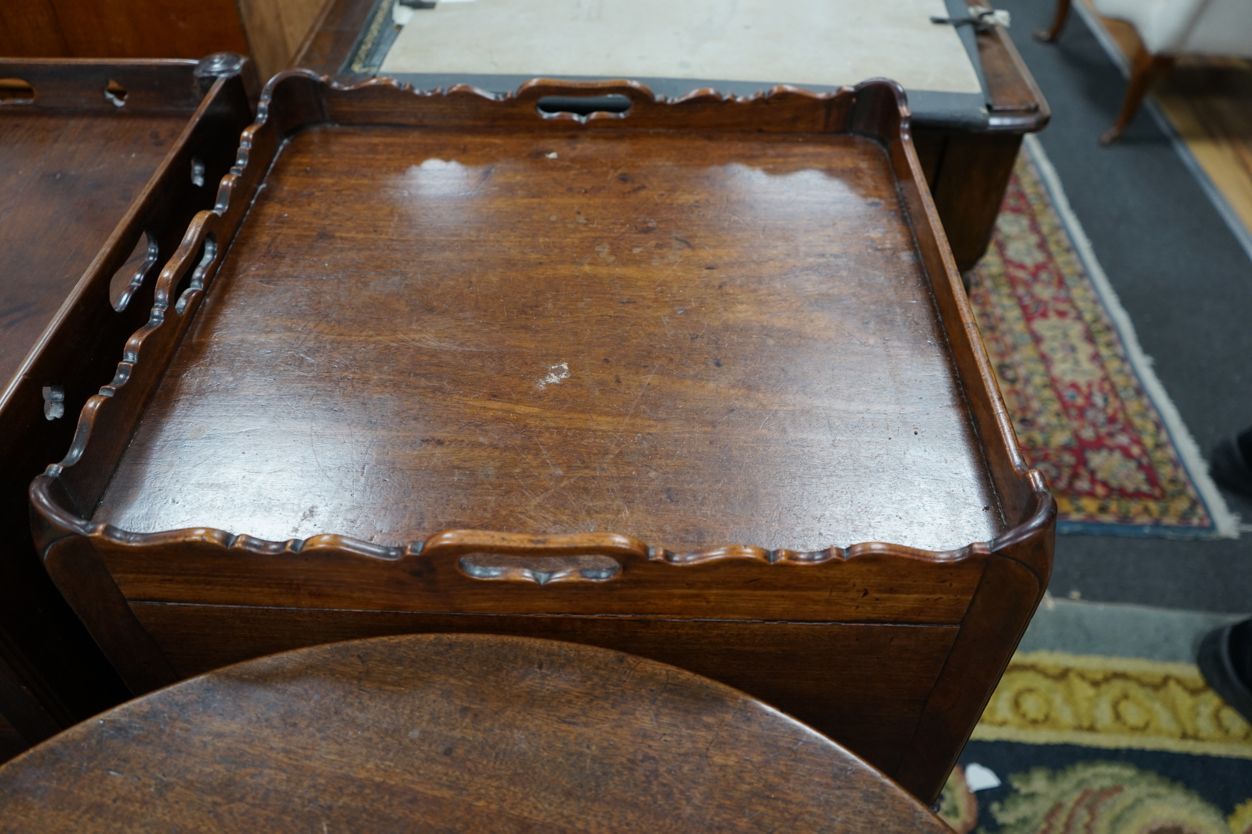 Two George III mahogany tray top bedside cabinets, larger width 56cm, depth 48cm, height 79cm